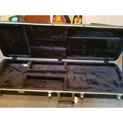 Deluxe lockable hard shell Guitar case with plush velvet lining.