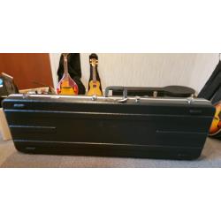 Deluxe lockable hard shell Guitar case with plush velvet lining.