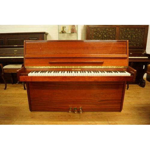 Modern compact Gilmahn upright piano. Tuned and delivery available