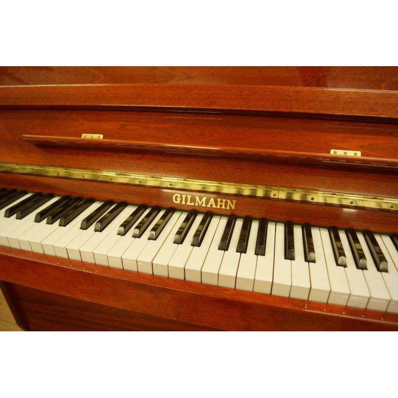 Modern compact Gilmahn upright piano. Tuned and delivery available