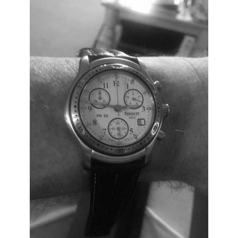 Gents Tissot chronograph strap wrist watch.