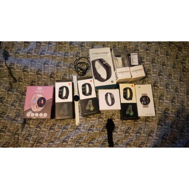 Various smart watches / fitness trackers