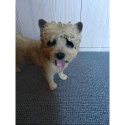 Cairn Terrier standing 10 inches across, height 7 inches . Vgc