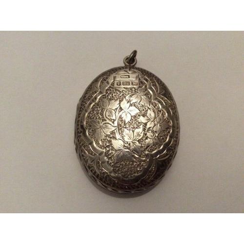 ABSOLUTE GEM; very fine and exquisite large antique silver locket marked Birmingham, circa 1881.