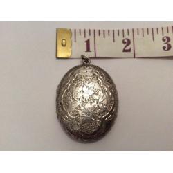 ABSOLUTE GEM; very fine and exquisite large antique silver locket marked Birmingham, circa 1881.