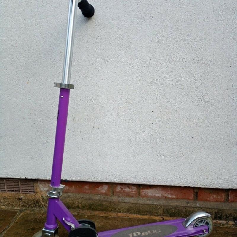 Purple JD bug scooter